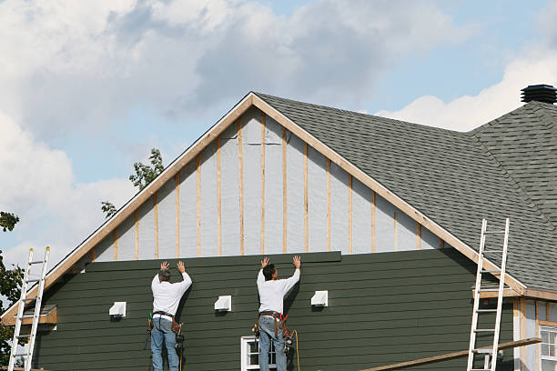 Professional Siding Contractor technician working in Creston, OH